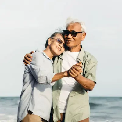 Couple dancing on beach