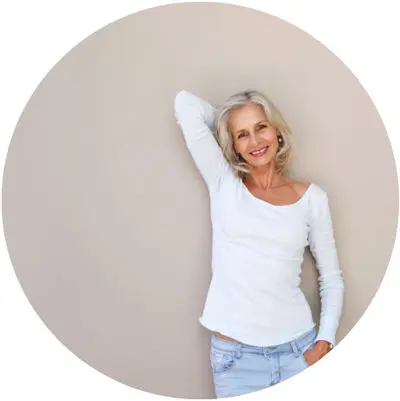 Woman leaning against wall